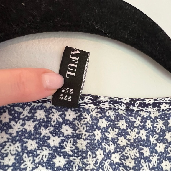 Flower Butterfly Sleeve Plunging Peplum Blouse - Picture 10 of 12